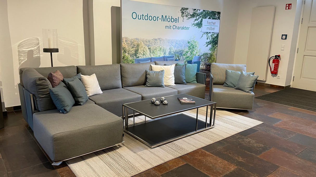 Fischer Suite Lounge mit Sessel und Kaffeetisch