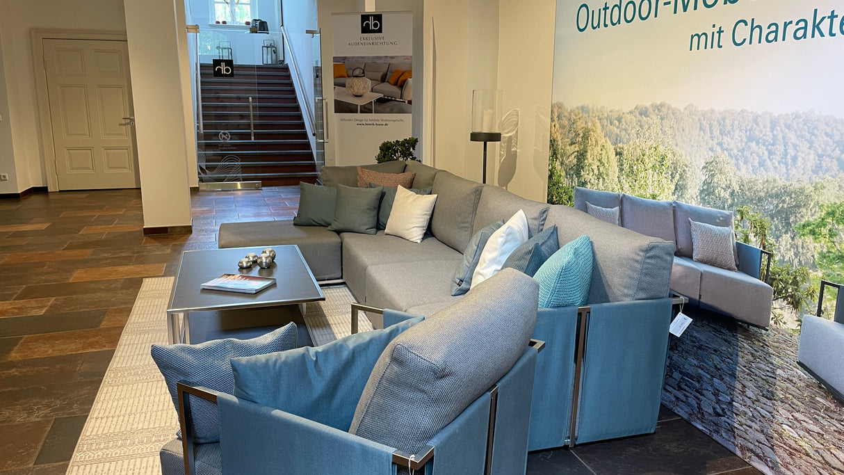 Fischer Suite Lounge mit Sessel und Kaffeetisch