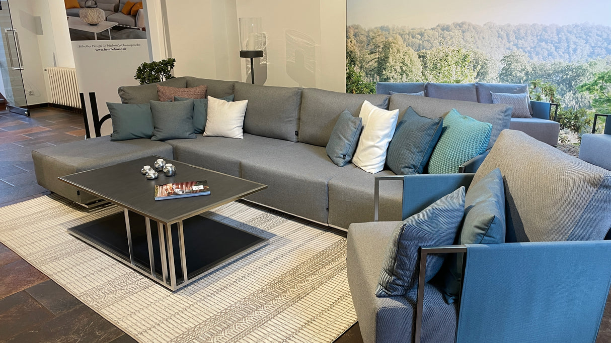 Fischer Suite Lounge mit Sessel und Kaffeetisch