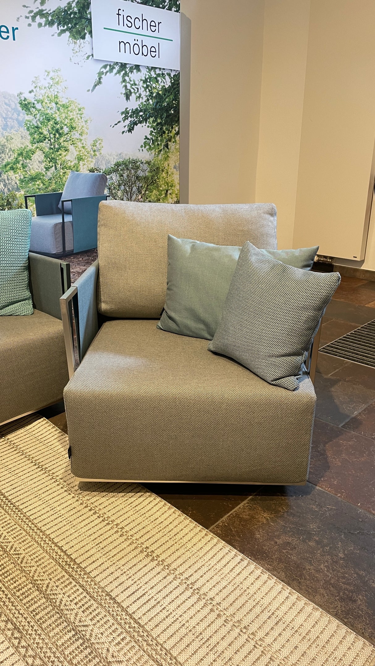 Fischer Suite Lounge mit Sessel und Kaffeetisch