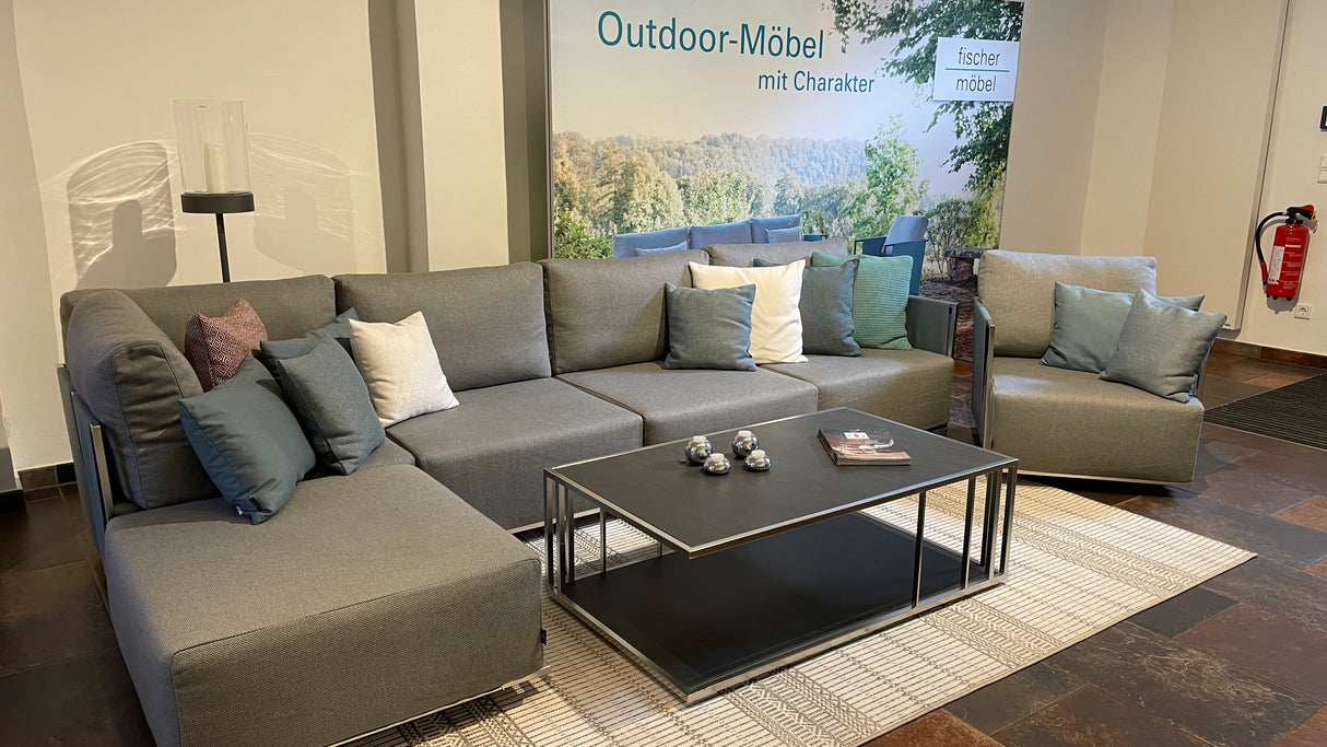 Fischer Suite Lounge mit Sessel und Kaffeetisch