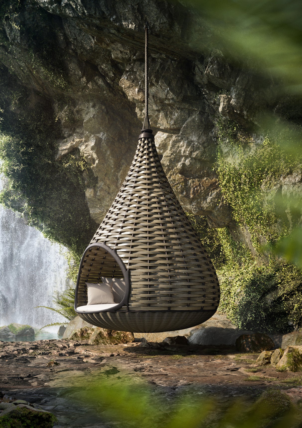 der_hanging-lounger_von_dedon_nestrest_in_einem_felsvorsprung_nahe_eines_wasserfalls_erhaeltlich_im_onlineshop_von_henrik-bosse.de